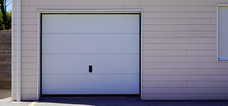 Wooden Garage Door Maintenance in The Acreage